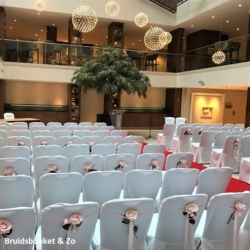 stoelversiering roos Avalanche Hilton Den Haag Hilton Den Haag trouwen
